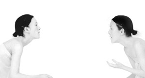 Contempoary art photography series of two Japanese characters greeting each other performed by Mimi Kato